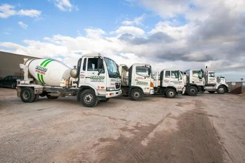D'Abaco garden supplies delivery trucks including a concrete delivery truck